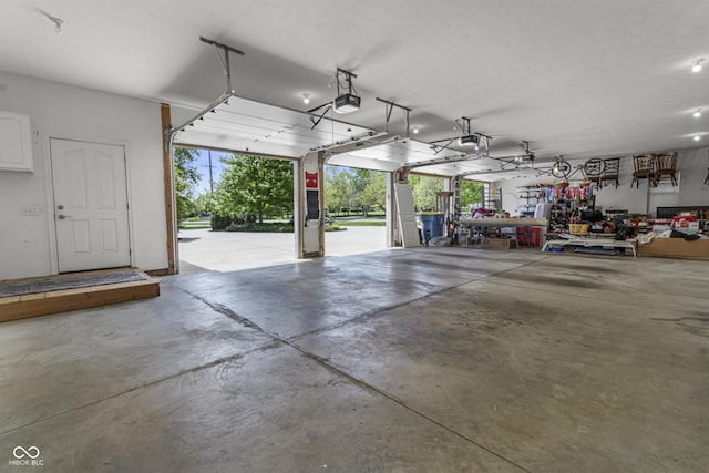 garage featuring a garage door opener