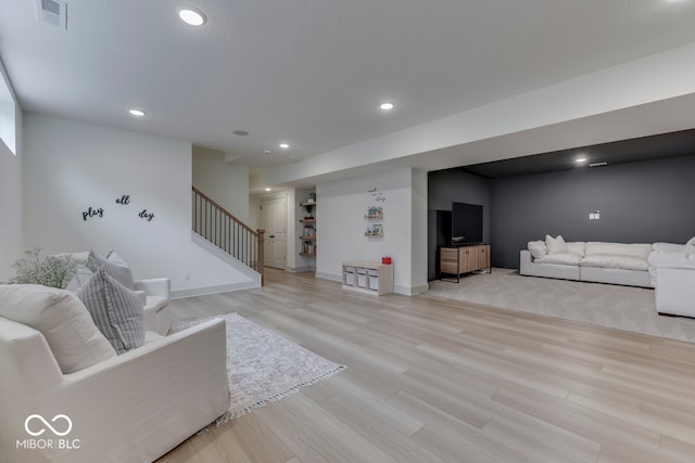 17346 Newton Main St, Westfield, IN 46074 - living room with stairway, light wood-type flooring, baseboards, and recessed lighting