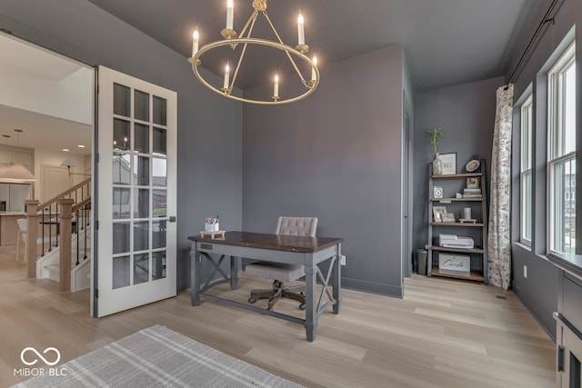 17346 Newton Main St, Westfield, IN 46074 - office with a chandelier, light wood-type flooring, french doors, and baseboards