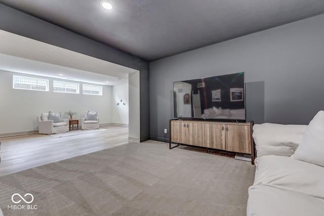 17346 Newton Main St, Westfield, IN 46074 - living area featuring recessed lighting, light colored carpet, baseboards, and light wood-type flooring