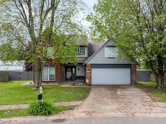 925 Mallory Pkwy, Franklin, IN 46131 - traditional home featuring driveway, an attached garage, and brick siding