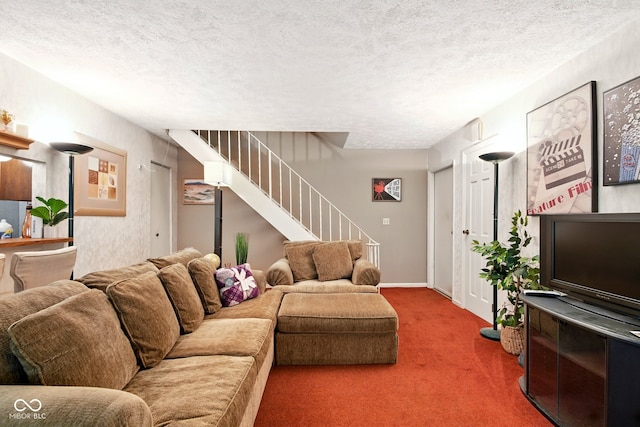 carpeted living area featuring stairway and a textured ceiling