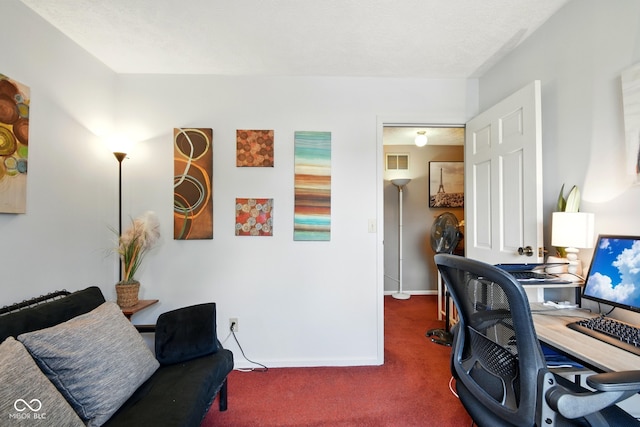 office featuring carpet and baseboards