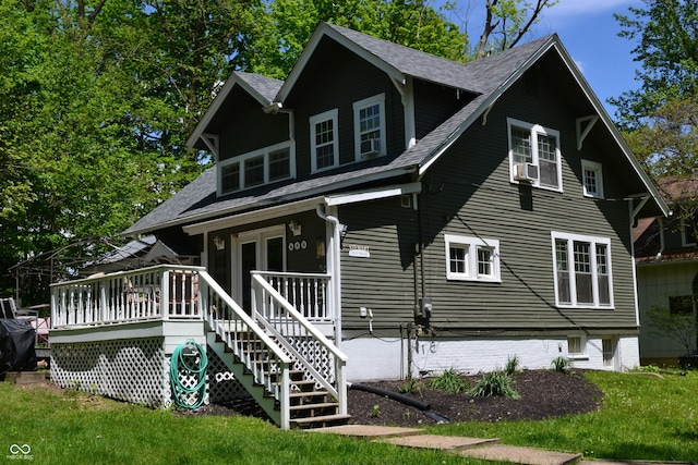 455 E Main St, Danville, IN 46122 - view of front of house with a shingled roof, cooling unit, a wooden deck, and a front yard