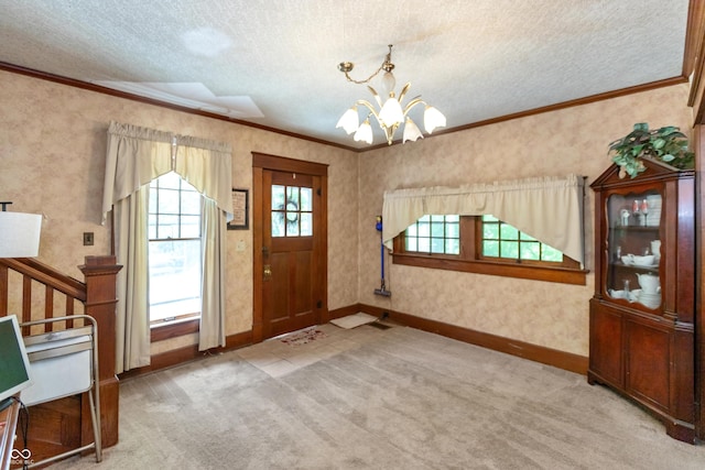 455 E Main St, Danville, IN 46122 - carpeted entrance foyer with a chandelier, a textured ceiling, crown molding, stairway, and baseboards