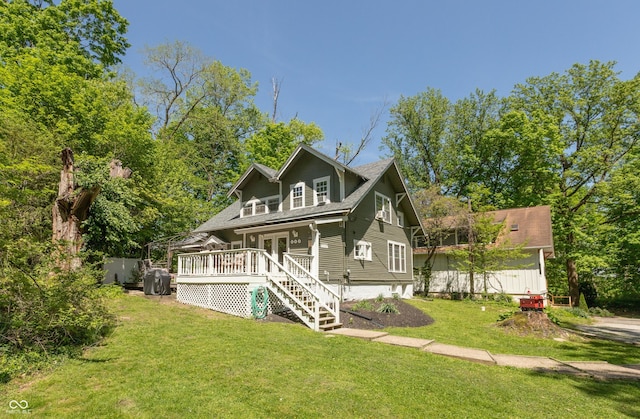 455 E Main St, Danville, IN 46122 - view of front of house with a front yard, stairs, a wooden deck, and a shingled roof