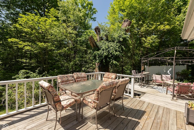 455 E Main St, Danville, IN 46122 - wooden terrace featuring outdoor dining space and an outdoor living space