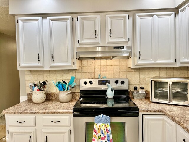kitchen featuring stainless steel range with electric stovetop, ventilation hood, tasteful backsplash, and white cabinets