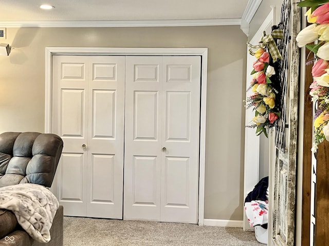 bedroom with light colored carpet, crown molding, a closet, baseboards, and recessed lighting