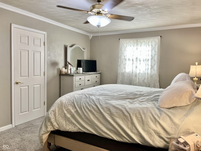 bedroom featuring carpet floors, ceiling fan, and ornamental molding