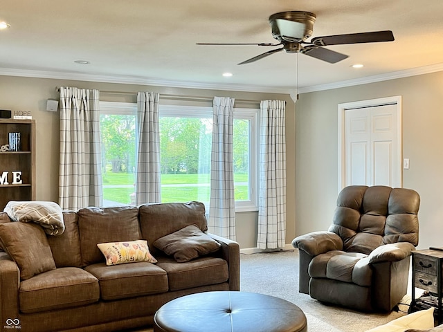 carpeted living room featuring a ceiling fan, ornamental molding, baseboards, and recessed lighting