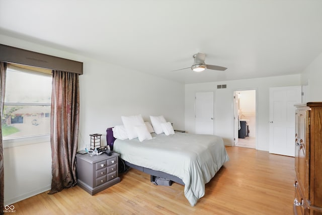 6825 Farmleigh Dr, Indianapolis, IN 46220 - bedroom with light wood-style floors, baseboards, and a ceiling fan