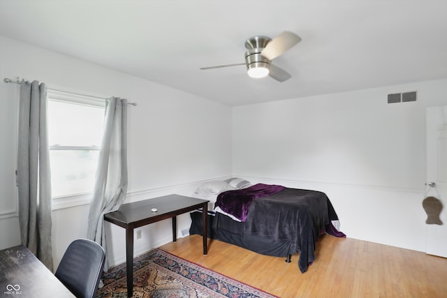 6825 Farmleigh Dr, Indianapolis, IN 46220 - bedroom with wood finished floors and a ceiling fan