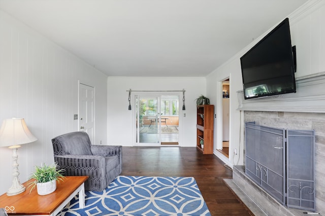 6825 Farmleigh Dr, Indianapolis, IN 46220 - living area with a fireplace, wood finished floors, and crown molding