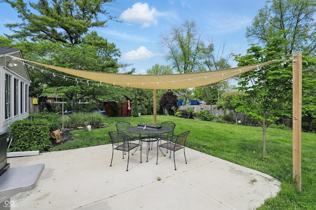 6825 Farmleigh Dr, Indianapolis, IN 46220 - view of patio / terrace featuring outdoor dining area