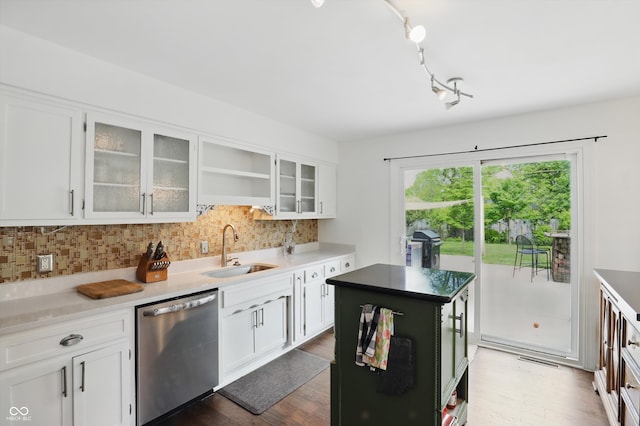 6825 Farmleigh Dr, Indianapolis, IN 46220 - kitchen with dishwasher, a sink, tasteful backsplash, and white cabinetry