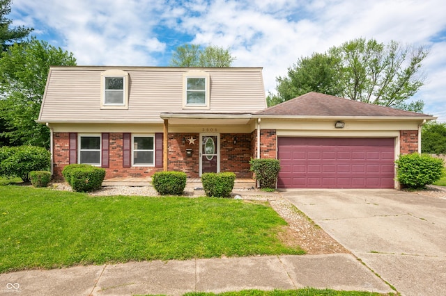 view of front of home with brick siding, an attached garage, a front lawn, and driveway
