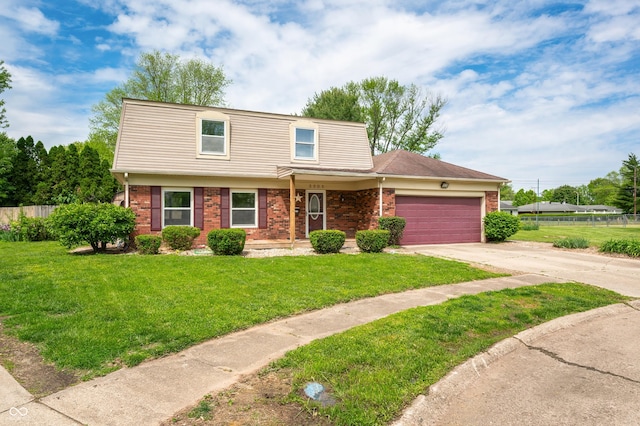 view of front facade with brick siding, an attached garage, and driveway