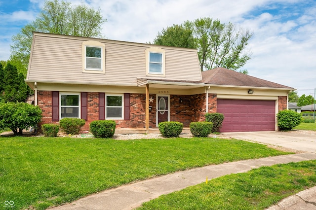 view of front of house with an attached garage, brick siding, concrete driveway, and a front yard