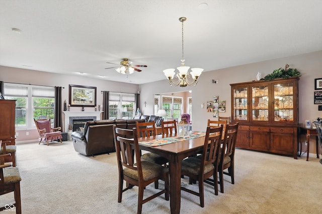 1663 Sweetgum Dr, Greenwood, IN 46143 - dining area with light carpet, plenty of natural light, and ceiling fan