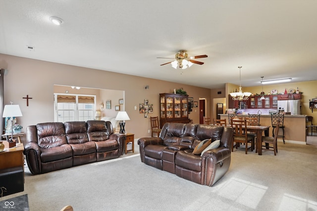 1663 Sweetgum Dr, Greenwood, IN 46143 - living area featuring a ceiling fan, light colored carpet, and a chandelier