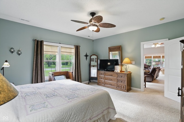 1663 Sweetgum Dr, Greenwood, IN 46143 - carpeted bedroom featuring baseboards and ceiling fan