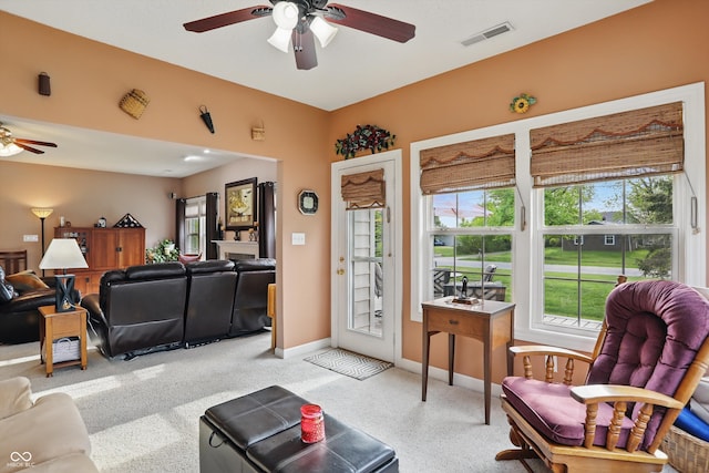 1663 Sweetgum Dr, Greenwood, IN 46143 - living room featuring a ceiling fan, carpet, and baseboards