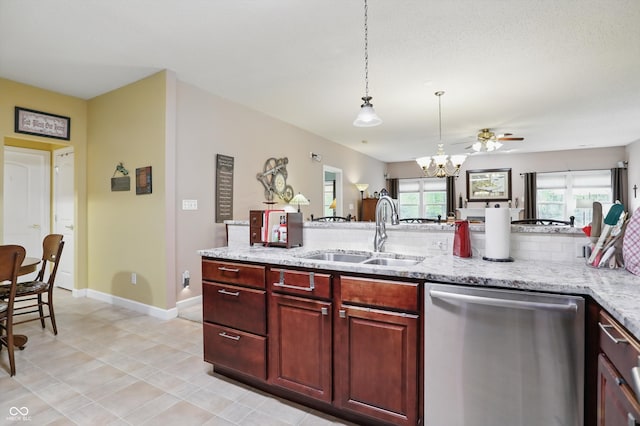 1663 Sweetgum Dr, Greenwood, IN 46143 - kitchen featuring dishwasher, a sink, a chandelier, reddish brown cabinets, and decorative light fixtures