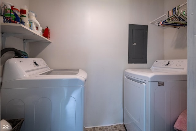laundry area featuring electric panel and independent washer and dryer