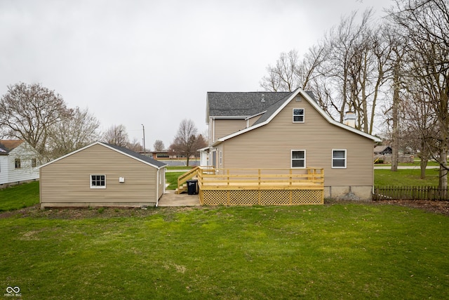 back of house featuring a wooden deck