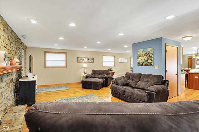 2769 S 800 W, Indianapolis, IN 46239 - living area with wood finished floors, healthy amount of natural light, and recessed lighting