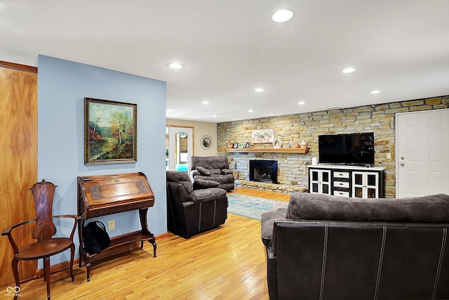 2769 S 800 W, Indianapolis, IN 46239 - living area featuring light wood-style flooring, a fireplace, and recessed lighting