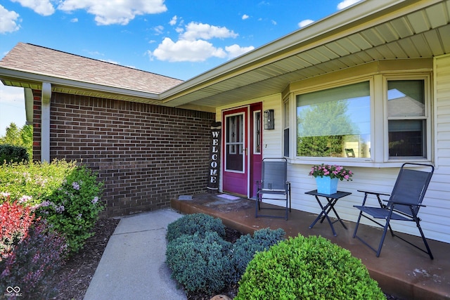 2769 S 800 W, Indianapolis, IN 46239 - view of exterior entry featuring brick siding and a shingled roof