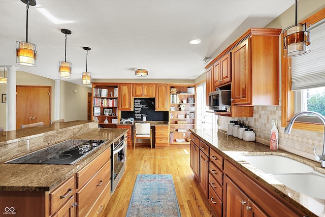 2769 S 800 W, Indianapolis, IN 46239 - kitchen featuring open shelves, a sink, appliances with stainless steel finishes, tasteful backsplash, and light wood-style floors