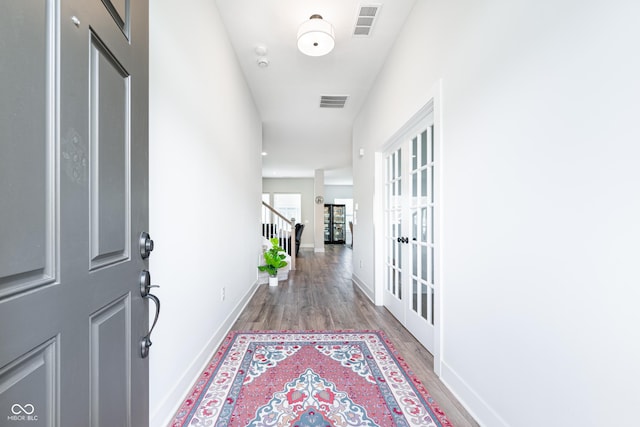 15792 Wiseman Dr, Fishers, IN 46040 - hallway featuring wood finished floors, baseboards, french doors, and stairs
