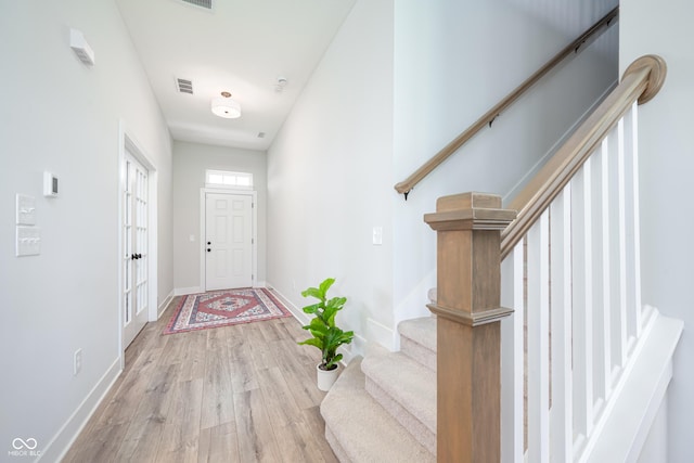 15792 Wiseman Dr, Fishers, IN 46040 - foyer with wood finished floors, stairs, and baseboards