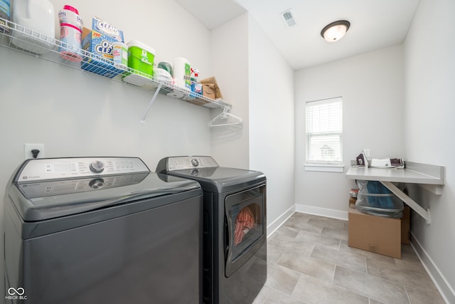 15792 Wiseman Dr, Fishers, IN 46040 - laundry area featuring separate washer and dryer and baseboards