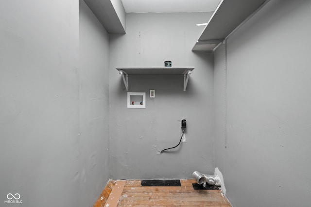 laundry area featuring hookup for a washing machine and wood finished floors