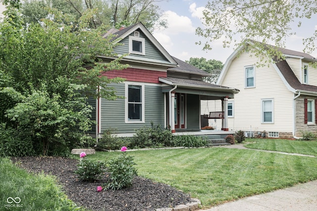 6159 Broadway St, Indianapolis, IN 46220 - view of front of property featuring a porch, a front yard, and a shingled roof