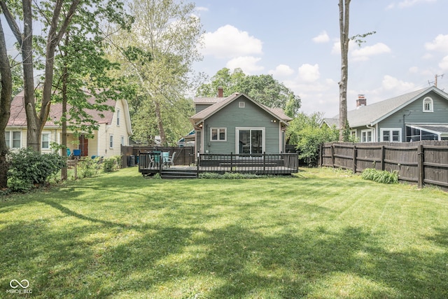 6159 Broadway St, Indianapolis, IN 46220 - rear view of house featuring a deck and a chimney