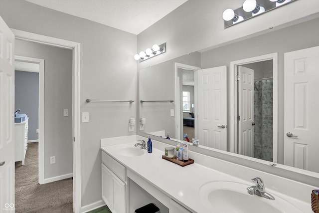 4032 Stubbington Ln, Indianapolis, IN 46239 - full bathroom with baseboards, double vanity, ensuite bathroom, and curtained shower