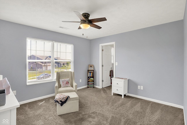 4032 Stubbington Ln, Indianapolis, IN 46239 - living area with ceiling fan, carpet floors, and baseboards