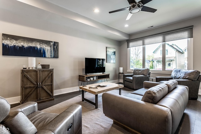 living area with wood finished floors, baseboards, a ceiling fan, and recessed lighting