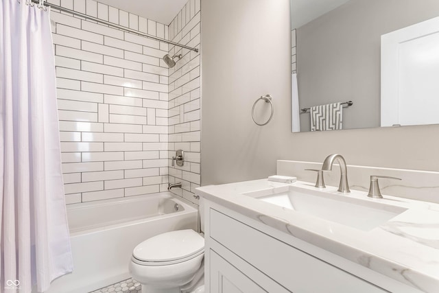 full bath featuring toilet, shower / bathtub combination with curtain, and vanity