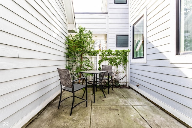 view of patio featuring outdoor dining space