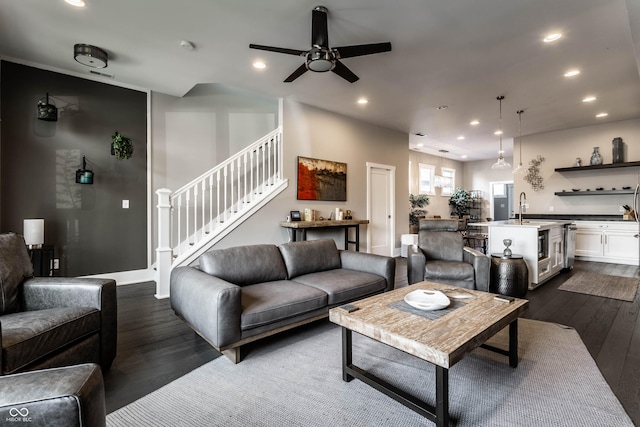living area featuring dark wood-style flooring, recessed lighting, stairway, and a ceiling fan