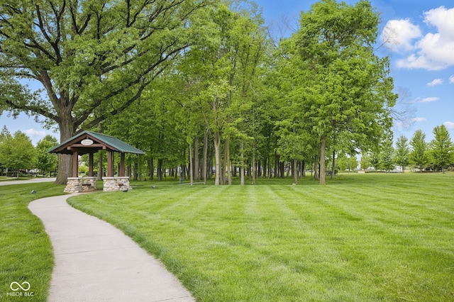 view of home's community with a yard and a gazebo