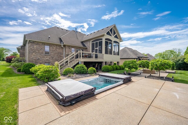 4890 Benthaven Dr E, Bargersville, IN 46106 - view of swimming pool with a covered hot tub, stairway, a wooden deck, a patio area, and a sunroom