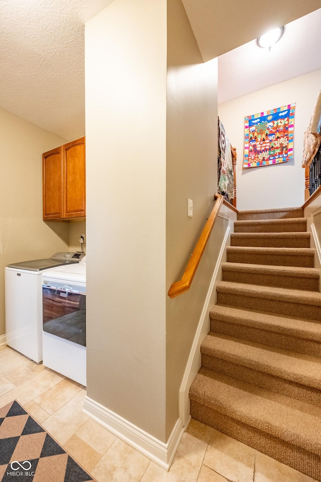 4890 Benthaven Dr E, Bargersville, IN 46106 - stairs with washer and clothes dryer, tile patterned flooring, and baseboards