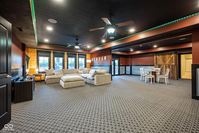 4890 Benthaven Dr E, Bargersville, IN 46106 - home theater room featuring a tray ceiling, carpet flooring, ceiling fan, and recessed lighting